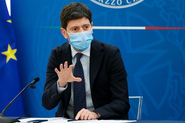 Italian Health Minister Roberto Speranza meets the media during a news conference to illustrate the government's new measures to cope with COVID-19 pandemic, in Rome, Friday, April 16, 2021. (Remo Casilli/Pool via AP)