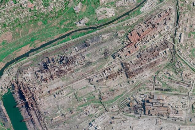 This satellite image from Planet Labs PBC shows damage at the Azovstal steelworks in Mariupol, Ukraine, Sunday, May 1, 2022. The United Nations said Sunday it was in the process of trying to safely evacuate people from the city. (Planet Labs PBC via AP)