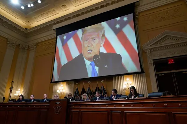 A video of former President Donald Trump is shown on a screen, as the House select committee investigating the Jan. 6 attack on the U.S. Capitol holds its final meeting on Capitol Hill in Washington, Monday, Dec. 19, 2022. (AP Photo/J. Scott Applewhite)