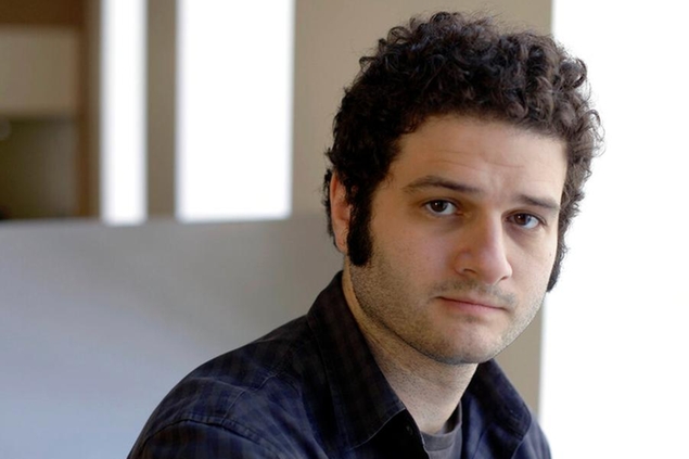 FILE-In this April 26, 2012 file photo, Dustin Moskovitz, a Facebook co-founder, poses outside of his office in San Francisco. Moskovitz says he is giving $20 million to help defeat Donald Trump, calling the Republican presidential candidate divisive and dangerous and his appeals to Americans who feel left behind \\\"quite possibly a deliberate con.\\\" (AP Photo/Eric Risberg)