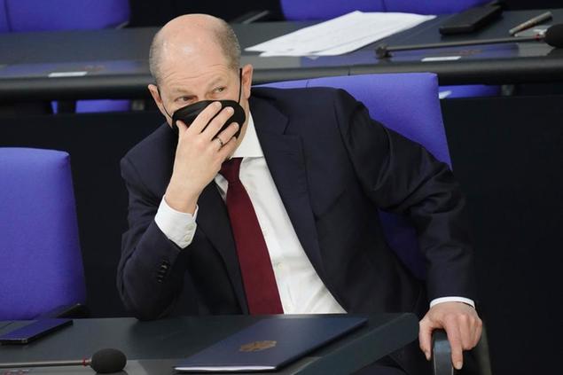 27 February 2022, Berlin: Chancellor Olaf Scholz (SPD) follows the special session of the Bundestag on the war in Ukraine. Photo by: Kay Nietfeld/picture-alliance/dpa/AP Images