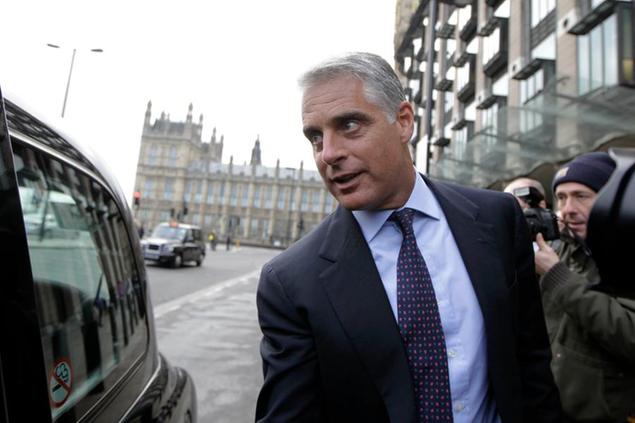 Chief Executive Officer of UBS, Andrea Orcel leaves Portcullis House in London after giving evidence on banking standards to the Parliamentary Commission on Banking Standards, Wednesday, Jan. 9, 2013. The chief executive of UBS\\u2019s investment bank told British MPs on Wednesday that bankers had become too arrogant and that the industry has to change. (AP Photo/Sang Tan)