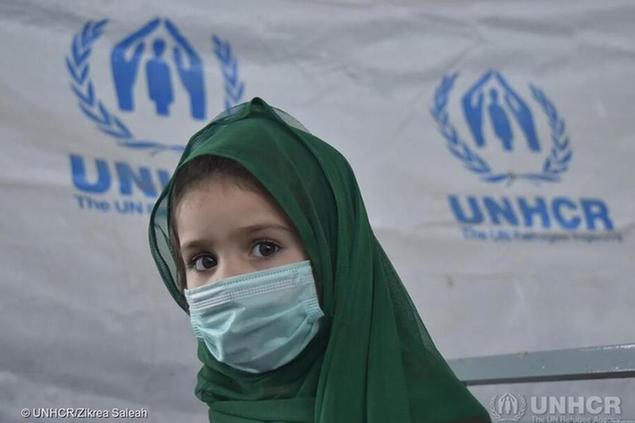 Una rifugiata afghana accolta dall'Unhcr