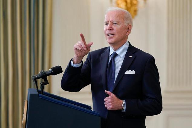 President Joe Biden takes questions from reporters as he speaks about the COVID-19 vaccination program, in the State Dining Room of the White House, Tuesday, May 4, 2021, in Washington. (AP Photo/Evan Vucci)