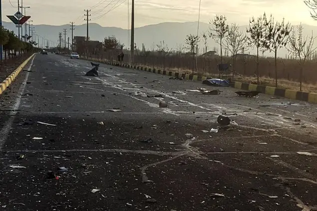 This photo released by the semi-official Fars News Agency shows the scene where Mohsen Fakhrizadeh was killed in Absard, a small city just east of the capital, Tehran, Iran, Friday, Nov. 27, 2020. Fakhrizadeh, an Iranian scientist that Israel alleged led the Islamic Republic\\\\'s military nuclear program until its disbanding in the early 2000s was “assassinated” Friday, state television said. (Fars News Agency via AP)