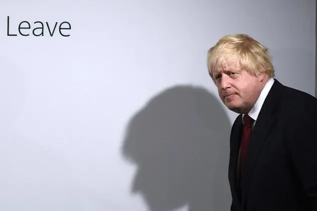 FILE - Vote Leave campaigner Boris Johnson arrives for a press conference at Vote Leave headquarters in London Friday, June 24, 2016. British media say Prime Minister Boris Johnson has agreed to resign on Thursday, July 7 2022, ending an unprecedented political crisis over his future. (Mary Turner/Pool via AP, File)