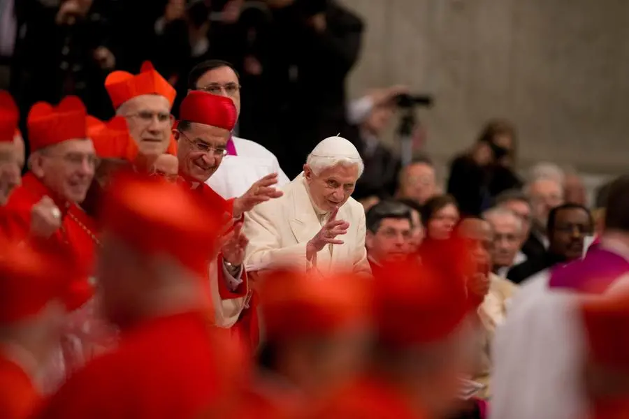 FILE - Pope Emeritus Benedict XVI attends a consistory led by Pope Francis inside St. Peter's Basilica at the Vatican on Feb. 22, 2014. Pope Emeritus Benedict XVI, the German theologian who will be remembered as the first pope in 600 years to resign, has died, the Vatican announced Saturday. He was 95. (AP Photo/Alessandra Tarantino, File) Associated Press/LaPresse EDITORIAL USE ONLY/ONLY ITALY AND SPAIN