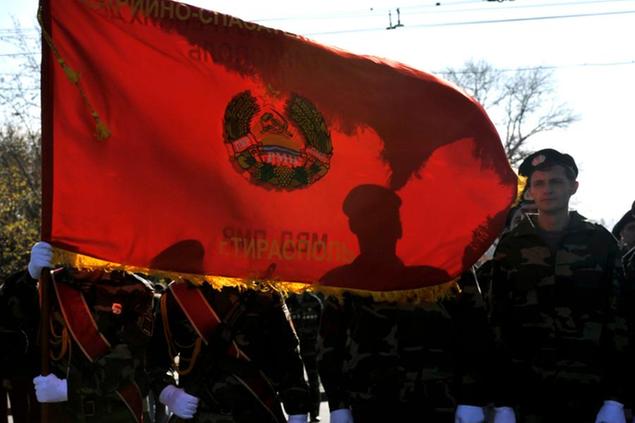 FILE-This Nov. 7, 2008 file photo shows Trans-Dniestrian soldiers lining up during the annual Soviet style military parade remembering the October Revolution in Tiraspol, Trans-Dniester, which is a separatist region of Moldova. (AP Photo/Bela Szandelszky) ** NO ONLN ** NO IONLN **