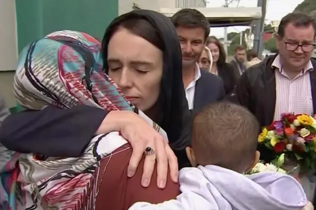 FILE - In this image made from video, New Zealand's Prime Minister Jacinda Ardern, center, hugs and consoles a woman as she visited Kilbirnie Mosque to lay flowers among tributes to Christchurch attack victims, in Wellington, on March 17, 2019. Ardern, whose empathetic handling of the nation’s worst mass-shooting and health-driven response to the coronavirus pandemic led her to become an international icon but who faced mounting criticism at home, said Thursday, Jan. 19, 2023 she was leaving office. (TVNZ via AP, File) Associated Press/LaPresse Only Italy and Spain