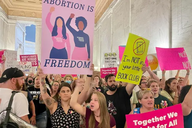 Abortion rights protesters chant outside of the West Virginia Senate chambers prior to a vote on an abortion bill, Friday, July 29, 2022, in Charleston, W.Va. (AP Photo/John Raby)