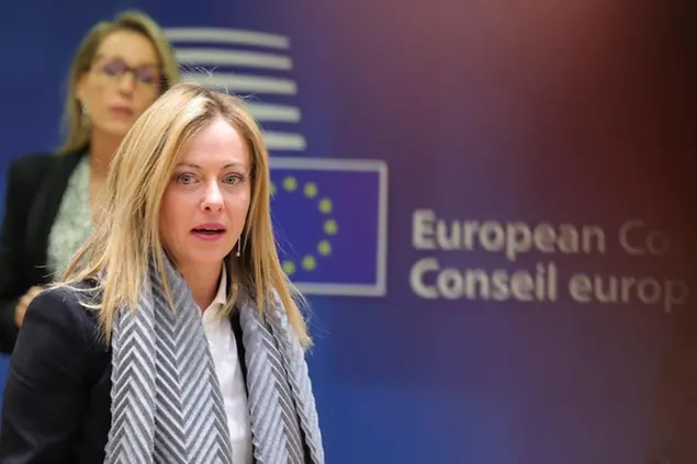 Italy's Prime Minister Giorgia Meloni, second left, arrives for a round table meeting at an EU summit in Brussels, Thursday, Dec. 15, 2022. EU leaders meet for a one day summit on Thursday to discuss Ukraine and further measures to contain energy prices hikes in the European Union. (AP Photo/Olivier Matthys)