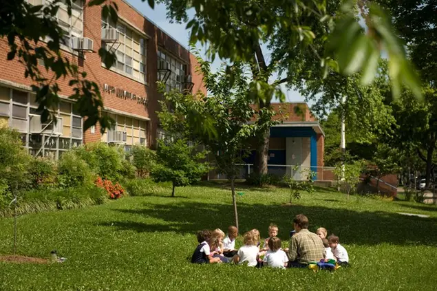 Teacher Coleman Rose conducts his pre-school spanish class in the yard of Maury Elementary School on Constitution Ave., NW, June 1, 2009. (CQ Roll Call via AP Images)