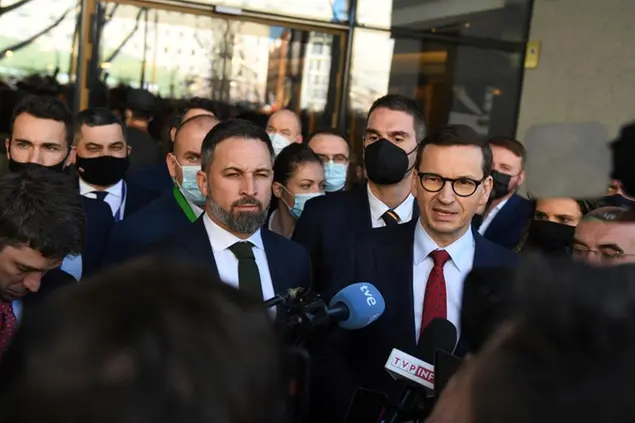 The president of Vox, Santiago Abascal (right), and the prime minister of Poland, Mateusz Morawiecki (left), make a speech to the media during the summit held this weekend, January 29, 2022, in Madrid (Spain). The aim of this meeting is to continue with the work started during the Warsaw Summit, last December, to defend Europe from external and internal threats, promoting an alternative to confront the globalist drift that threatens the European Union by attacking the sovereignty of nations. Santiago Abascal has already traveled several times to Poland and Hungary to analyze the situation with his partners in both parties. 29 JANUARY 2022;POLITICS;SANTIAGO ABASCAL;VOX;MATEUSZ MORAWIECKI;POLAND Fernando SÃ¡nchez / Europa Press 01/29/2022 (Europa Press via AP)