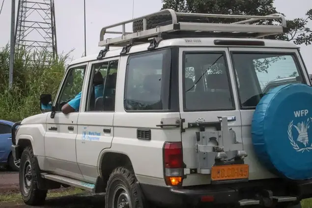 The vehicle in which the Italian ambassador to Congo was killed, according to those at the scene, sits with a smashed window in Nyiragongo, North Kivu province, Congo Monday, Feb. 22, 2021. The Italian ambassador to Congo Luca Attanasio, an Italian carabineri police officer and their Congolese driver were killed Monday in an attack on a U.N. convoy in an area that is home to myriad rebel groups, the Foreign Ministry and local people said. (AP Photo/Justin Kabumba)
