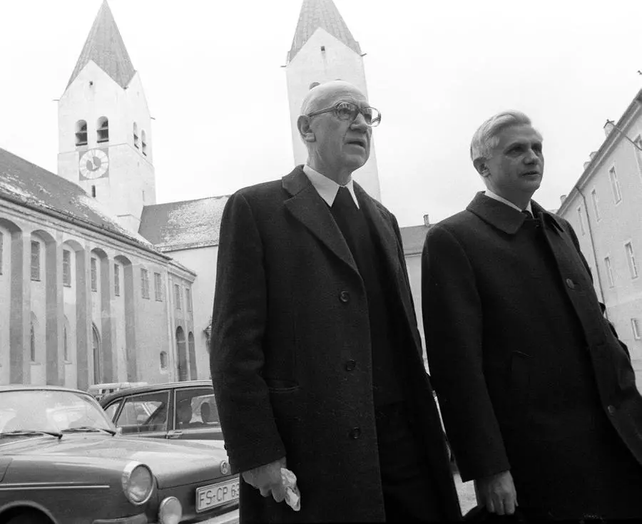 FILE - Newly nominated Archbishop of Munich and Freising, Joseph Ratzinger, right, walks with bishop Ernst Tewes in front of the cathedral at Freising, Germany, on March 31, 1977. Tewes consecrated Ratzinger on the Saturday of Pentecost. Pope Emeritus Benedict XVI, the German theologian who will be remembered as the first pope in 600 years to resign, has died, the Vatican announced Saturday. He was 95. (AP Photo/Dieter Endlicher, File) Associated Press/LaPresse EDITORIAL USE ONLY/ONLY ITALY AND SPAIN