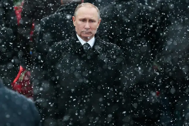 FILE - In this Thursday, Feb. 23, 2017 file photo, Russian President Vladimir Putin attends a wreath-laying ceremony at the Tomb of the Unknown Soldier in Moscow, Russia. Russian lawmakers on Friday, Dec, 15 set the presidential election for March 18, a move that formally sets in motion campaigning for a race that Putin is all but certain to win. Voter apathy is the main challenge for Putinâ€™s strategists, who want to make his result as strong as ever to prove that public support for the Russian leader hasnâ€™t withered 18 years after his first election (AP Photo/Ivan Sekretarev, file)