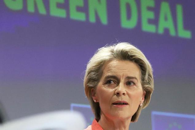 European Commission President Ursula von der Leyen speaks during a media conference at EU headquarters in Brussels, Wednesday, July 14, 2021. The European Union is unveiling Wednesday sweeping new legislation to help meet its pledge to cut emissions of the gases that cause global warming by 55% over this decade, including a controversial plan to tax foreign companies for the pollution they cause. (AP Photo/Valeria Mongelli)