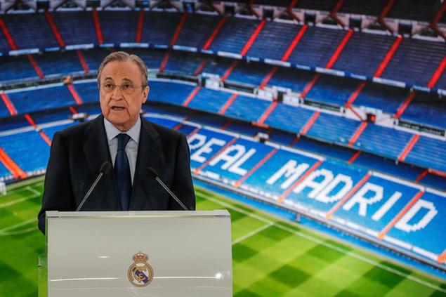FILE - In this June 13, 2019 file photo, Real Madrid's President Florentino Perez gives a speech at the Santiago Bernabeu stadium in Madrid, Spain. The Super League's founding chairman Florentino Perez on Tuesday, April 20, 2021 says the competition is being created to save soccer for everyone and not to make the rich clubs richer. The Real Madrid president says it's \\\"impossible\\\" that players from the participating teams will be banned by UEFA. (AP Photo/Manu Fernandez, File)