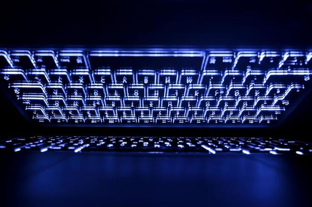 09 April 2019, Hessen, R'sselsheim: LLUSTRATION - The illuminated keyboard of a laptop is reflected on the screen. Photo by: Silas Stein/picture-alliance/dpa/AP Images