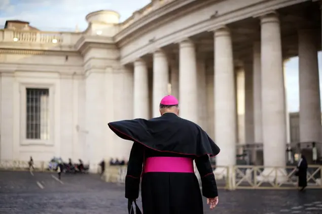Robert W. McElroy, bishop of the diocese of San Diego, walks in St.Peter's Square to attend a conference on nuclear disarmament at the Vatican, Friday, Nov. 10, 2017. The Vatican hosted Nobel laureates, U.N. and NATO officials and a handful of nuclear powers at a conference aimed at galvanizing support for a global shift from the Cold War era policy of nuclear deterrence to one of total nuclear disarmament. (AP Photo/Andrew Medichini)