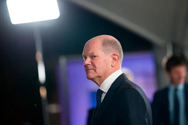 03 October 2022, Berlin: Chancellor Olaf Scholz (SPD) stands in front of the Federal Chancellery during the reception of the President of France on the occasion of the Day of German Unity. Photo by: Fabian Sommer/picture-alliance/dpa/AP Images