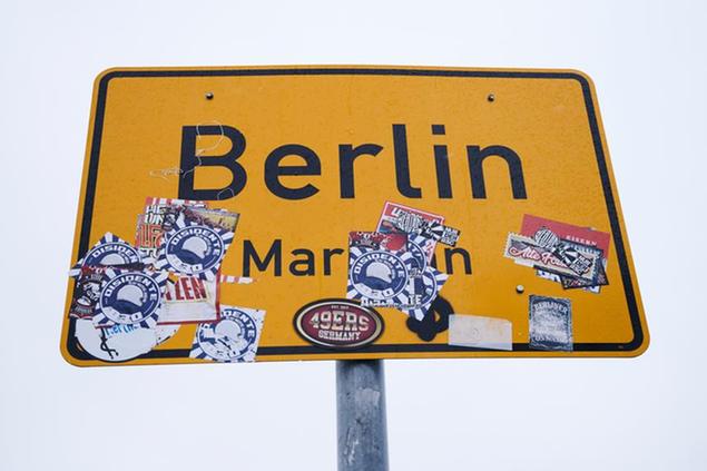 12 January 2021, Berlin: On the border between Berlin and Brandenburg is the place-name sign for Berlin Marzahn. To contain the pandemic, the 15-kilometer rule for Berlin is to come. Photo by: Annette Riedl/picture-alliance/dpa/AP Images