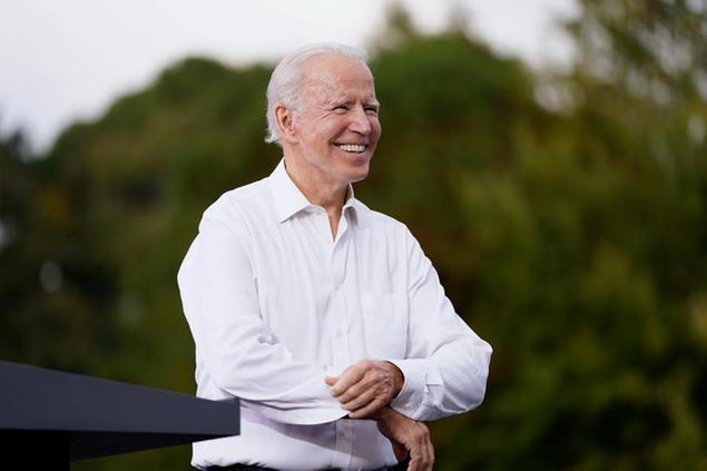 Democratic presidential candidate former Vice President Joe Biden arrives to speak at a drive-in rally at Cellairis Amphitheatre in Atlanta, Tuesday, Oct. 27, 2020. (AP Photo/Andrew Harnik)