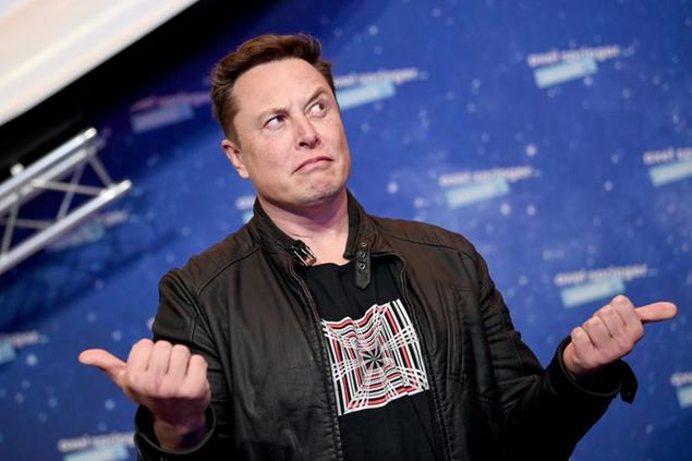 FILE - SpaceX owner and Tesla CEO Elon Musk arrives on the red carpet for the Axel Springer media award, in Berlin, Germany, Tuesday, Dec. 1, 2020. (Britta Pedersen/Pool via AP, File)