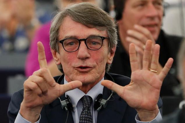 Italy's David-Maria Sassoli shows seven fingers for the number of voices missing to be elected as President at the European Parliament in the first round vote in Strasbourg, eastern France, Wednesday July 3, 2019. European Union legislators are gearing up to elect their parliamentary leader \\u00E2\\u20AC\\u201D a decision that will complete the bloc's drawn-out appointment process for its top jobs. (AP Photo/Jean-Francois Badias)
