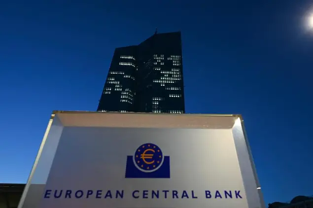 14 December 2022, Hessen, Frankfurt/Main: A stele with the inscription \\\"European Central Bank Eurosystem\\\" is illuminated at sunset in front of the European Central Bank (ECB) headquarters. On Dec. 15, 2022, Europe's top monetary guardians will decide on new interest rate steps at their regular council meeting. Photo by: Arne Dedert/picture-alliance/dpa/AP Images