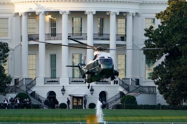 Marine One lifts off from the White House to carry President Donald Trump to Walter Reed National Military Medical Center in Bethesda, Md., Friday, Oct. 2, 2020 in Washington. The White House says Trump will spend a \\\"few days\\\" at the military hospital after contracting COVID-19.(AP Photo/Manuel Balce Ceneta)