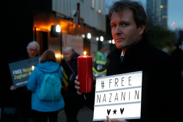 FILE -- In this Jan. 16, 2017 file photo, Richard Ratcliffe husband of imprisoned British-Iranian dual national Nazanin Zaghari-Ratcliffe, poses during an Amnesty International led vigil outside the Iranian Embassy in London. Nazanin Zaghari-Ratcliffe, an Iranian-British woman long held in Tehran has been sentenced to another year in prison in Iran, her lawyer said Monday, April 26, 2021. (AP Photo/Alastair Grant, File)