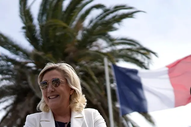 (Marine Le Pen durante la campagna per le amministrative. Foto AP)