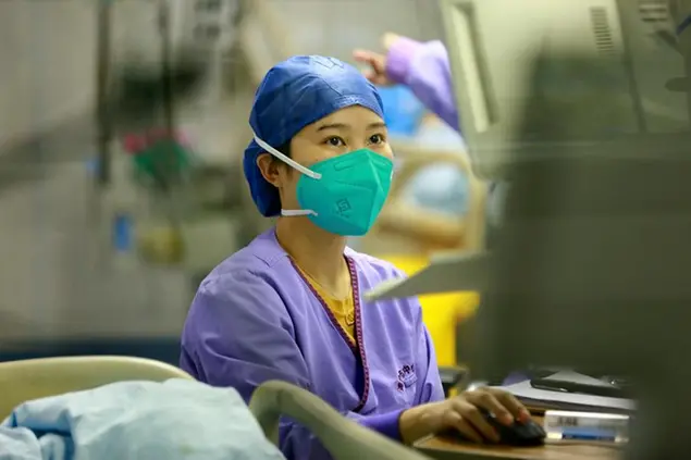 A nurse works in the ICU ward at a hospital in Suining in southwest China's Sichuan province Saturday, Dec. 31, 2022. (FeatureChina via AP Images)