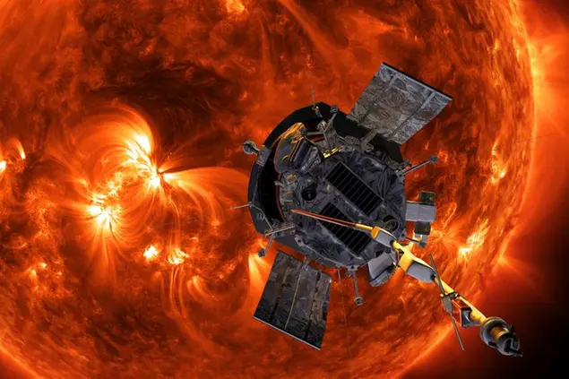 This image made available by NASA shows an artist's rendering of the Parker Solar Probe approaching the Sun. It's designed to take solar punishment like never before, thanks to its revolutionary heat shield thatâ€™s capable of withstanding 2,500 degrees Fahrenheit (1,370 degrees Celsius). (Steve Gribben/Johns Hopkins APL/NASA via AP)