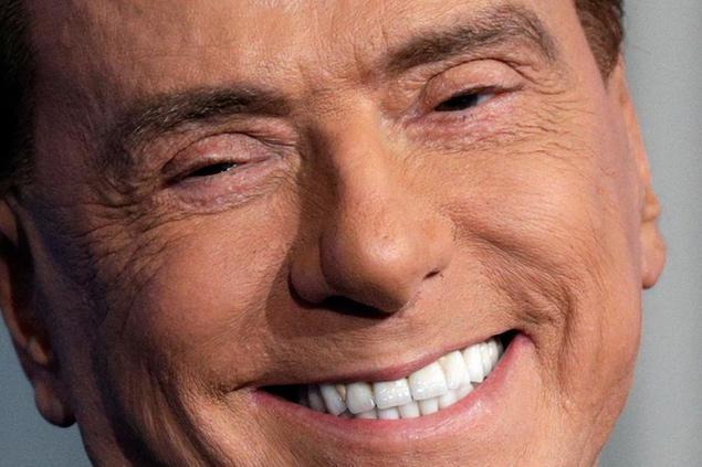FILE - Italian former Premier and Forza Italia (Go Italy) party leader, Silvio Berlusconi, smiles during the recording of the Italian state television RAI, Porta a Porta (Door To Door) TV talk show in Rome Thursday, Jan. 11, 2018. Italy is poised to elect a new president, a figure who is supposed to serve as the nation's moral compass and foster unity by being above the political fray. Silvio Berlusconi thinks he fits the bill. (AP Photo/Andrew Medichini, File)