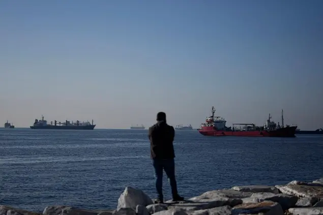 Cargo ships anchored in the Marmara Sea await to cross the Bosphorus Straits in Istanbul, Turkey, Tuesday, Nov. 1, 2022. Turkey's defense minister urged Russia to \\\"reconsider\\\" its decision to suspend the implementation of the U.N. and Turkish-brokered grain deal in a telephone call Monday with his Russian counterpart, Sergei Shoigu. (AP Photo/Khalil Hamra)