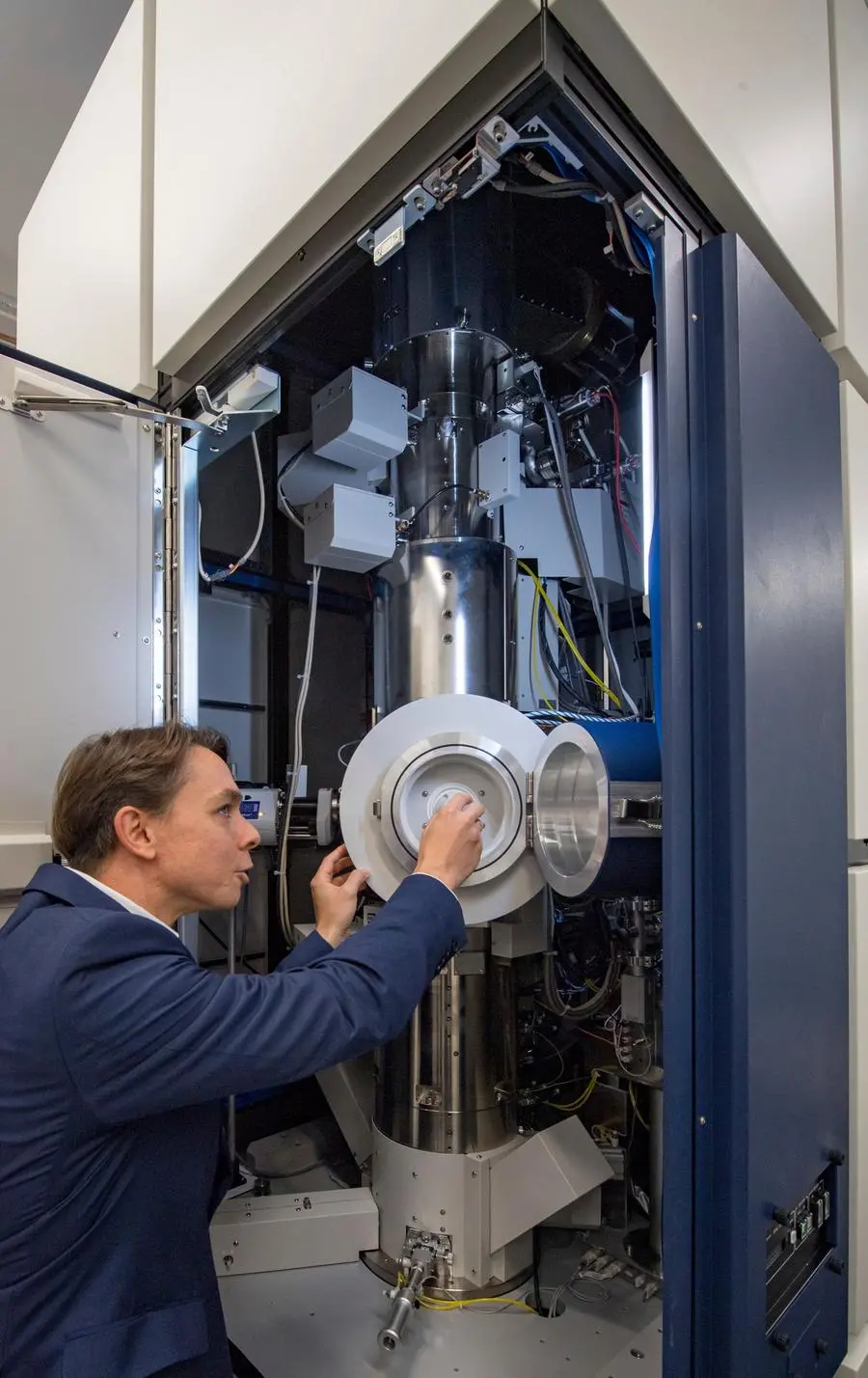 18 September 2019, Saxony-Anhalt, Halle (Saale): Christian Patzig, scientist at the Fraunhofer Institute in Halle, shows a transmission electron microscope. This and other new devices are now available to scientists in a modern extension of the Fraunhofer Competence Center for Applied Electron Microscopy and Microstructure Diagnostics in Halle. With the new analytical methods, the centre is in a position to offer customers from the electronics and optical materials sectors even more precise insights into materials. The costs for the extension building with the laboratories amounted to almost 10 million euros. Photo by: Hendrik Schmidt/picture-alliance/dpa/AP Images