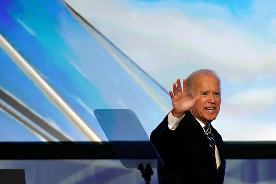 Vice President Joe Biden waves to the audience after giving a speech at the Solar Power International Trade Show in Anaheim, Calif., Wednesday, Sept. 16, 2015. Taking aim at his potential political opponents, Biden railed against Republicans who \\\"deny climate change\\\" and want to shut down the federal government over funding for Planned Parenthood, and pleaded with them to \\\"just get out of the way.\\\" (AP Photo/Christine Cotter)