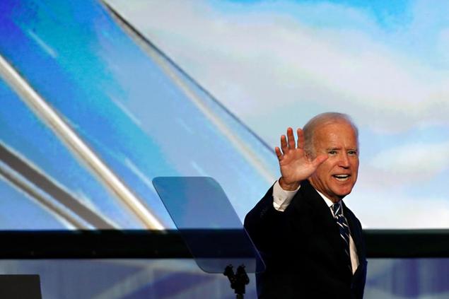 Vice President Joe Biden waves to the audience after giving a speech at the Solar Power International Trade Show in Anaheim, Calif., Wednesday, Sept. 16, 2015. Taking aim at his potential political opponents, Biden railed against Republicans who \\\"deny climate change\\\" and want to shut down the federal government over funding for Planned Parenthood, and pleaded with them to \\\"just get out of the way.\\\" (AP Photo/Christine Cotter)