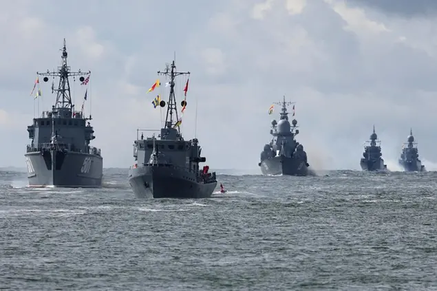 Warships float during a rehearsal for the Naval parade in Baltiysk, a Navy base in Russian Baltic Sea exclave, Russia, Thursday, July 28, 2022. The celebration of Navy Day in Russia is traditionally marked on the last Sunday of July and will be celebrated on July 31 this year. (AP Photo)