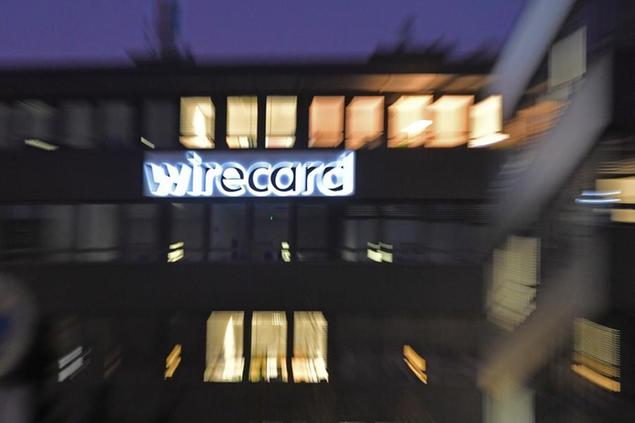 Wirecard AG headquarters in Aschheim Dorafter in the evening of December 2nd, 2020. wirecard logo, company emblem, lettering, building, facade, headquarters in Aschheim Dorafter WIRECARD AG. | usage worldwide Photo by: Frank Hoermann/SVEN SIMON/picture-alliance/dpa/AP Images