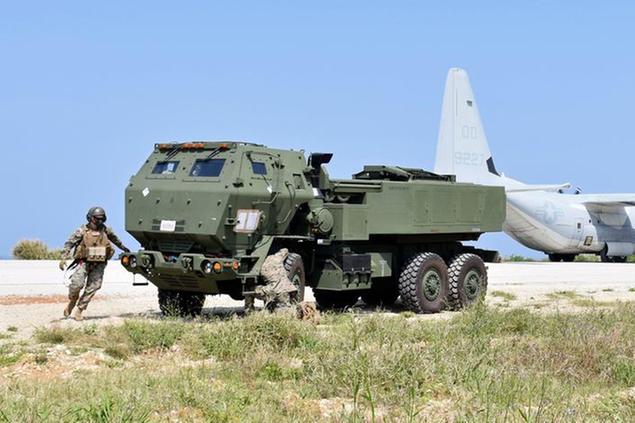 Photo taken on a U.S. military airfield on Iejima Island in Ie village in Okinawa Prefecture, southern Japan, on March 15, 2021, shows the multiple rocket launcher HIMARS. U.S. forces in Japan unveiled a drill of a new operation to the media amid China's active maritime military activities. (Kyodo via AP Images) ==Kyodo