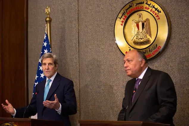 U.S. climate envoy John Kerry, left, speaks during a press conference with Egyptian Foreign Minister Sameh Shoukry, at the foreign ministry headquarters in Cairo, Egypt, Monday, Feb. 21, 2022. (AP Photo/Amr Nabil)