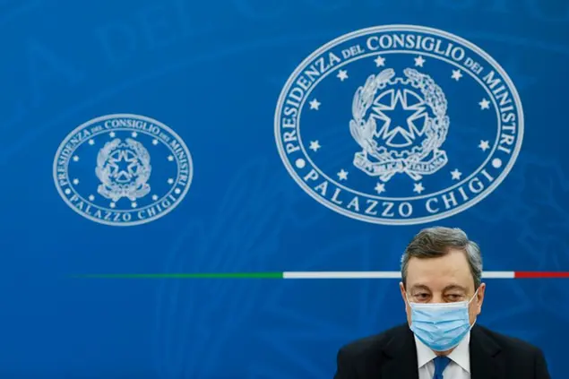 Italian Premier Mario Draghi meets the media during a news conference to illustrate the government's new measures to cope with COVID-19 pandemic, in Rome, Friday, April 16, 2021. (Remo Casilli/Pool via AP)