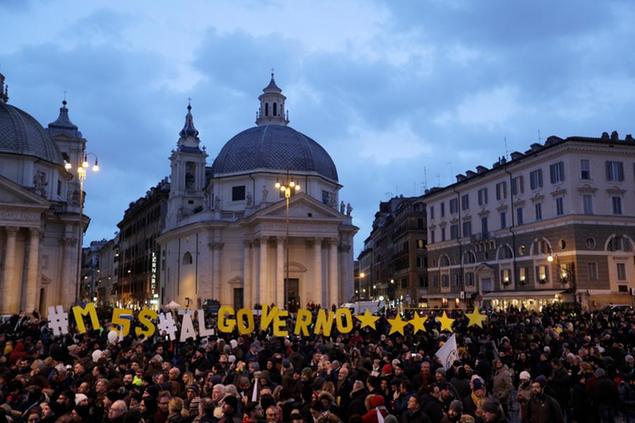 Supporters of Five-Star Movement (M5S) attend the party's final rally in Rome, Friday, March 2, 2018. General elections in Italy will be held Sunday. (AP Photo/Andrew Medichini)