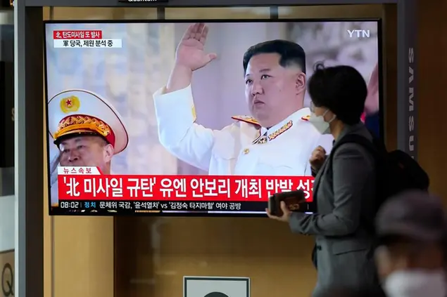 A TV screen showing a news program reporting about North Korea's missile launch with file footage of North Korean leader Kim Jong Un, is seen at the Seoul Railway Station in Seoul, South Korea, Thursday, Oct. 6, 2022. North Korea launched two ballistic missiles toward its eastern waters on Thursday, as the United States redeployed one of its aircraft carriers near the Korean Peninsula in response to the North's recent launch of a powerful missile over Japan. (AP Photo/Lee Jin-man)