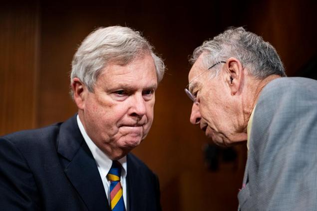 UNITED STATES - JULY 21: Secretary of Agriculture Thomas Vilsack, left, speaks with Sen. Chuck Grassley, R-Iowa, before the start of the Senate Judiciary Committee hearing on immigrant farmworkers and feeding America on Wednesday, July 21, 2021. (Photo by Bill Clark/CQ Roll Call via AP Images)
