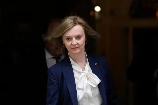 FILE - Liz Truss, Britain's Foreign Secretary leaves a Cabinet meeting at 10 Downing Street in London, Tuesday, April 19, 2022. Britain's new leader, Liz Truss, is the child of left-wing parents who grew up to be an admirer of Conservative Prime Minister Margaret Thatcher. Now she is taking the helm as prime minister herself, with a Thatcherite zeal to transform the U.K. One colleague who has known Truss since university says she is \\u201Ca radical\\u201D who wants to \\u201Croll back the intervention of the state\\u201D in people\\u2019s lives, just as Thatcher once did. (AP Photo/Alastair Grant, File)