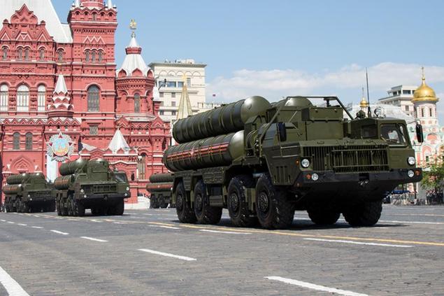 FILE In this file photo taken on Monday, May 9, 2016, Russian the S-300 air defense missile systems drive during the Victory Day military parade marking 71 years after the victory in WWII in Red Square in Moscow, Russia. Moscow will supply the Syrian government with modern S-300 missile defense systems following last week\\u00E2\\u20AC\\u2122s downing of a Russian plane, the Russian Defense Minister announced on Monday Sept. 24, 2018.(AP Photo/Alexander Zemlianichenko, File)